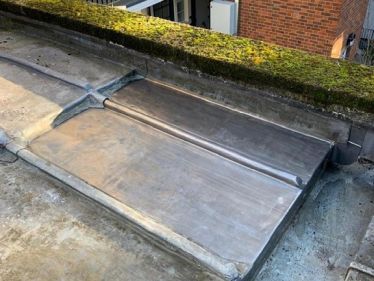 Two new code 6 lead bays treated with patination oil and renewed timber 18mm WBP plywood and new lead roll & lead underfelt