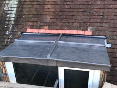 Renewed dormer roof with new code 5 lead and new ply to falls to replace existing copper coverings in Kennington, London