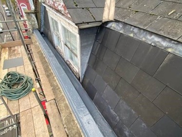Renewed gutter coverings using Sika Liquid Plastic coatings and refalled to prevent water pooling in the gutter, Oval London