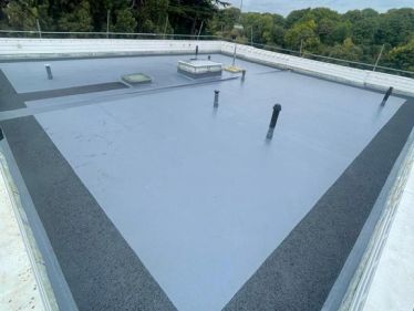 Sika Liquid Plastics coating with trafficable walkway system after laying Sika Liquid Plastic carrier membrane in Twickenham