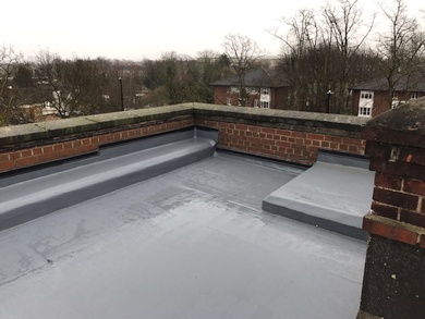 Renewed roof with self-adhesive vapour control layer, PIR flat board insulation, carrier membrane & liquid coating system
